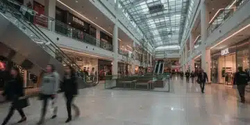 Modern shopping mall with subtle hints of reduced foot traffic, symbolizing retail trends for 2025